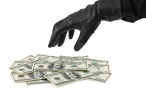 hand stealing money