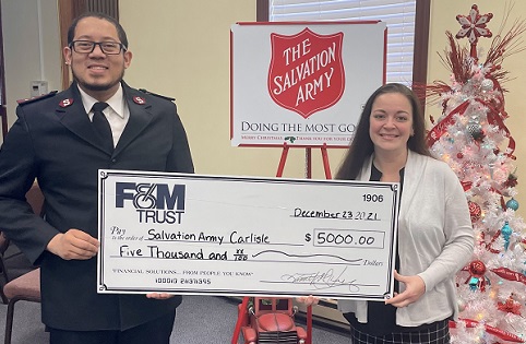 bank rep presents $5,000 check to Salvation Army rep
